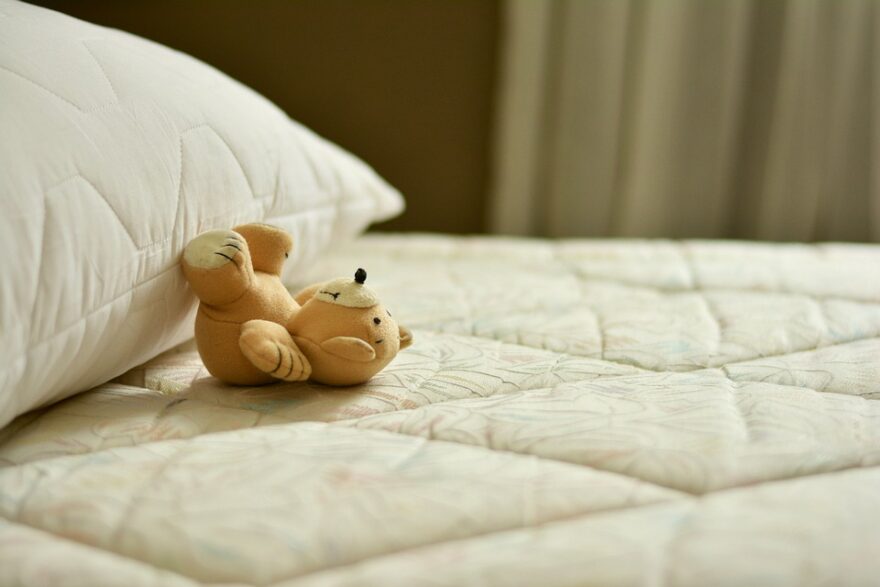 mattress with teddy bear